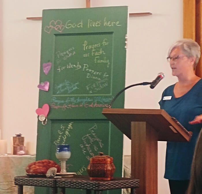 Pastor Donna preaching at UCC Church in St. Augustine